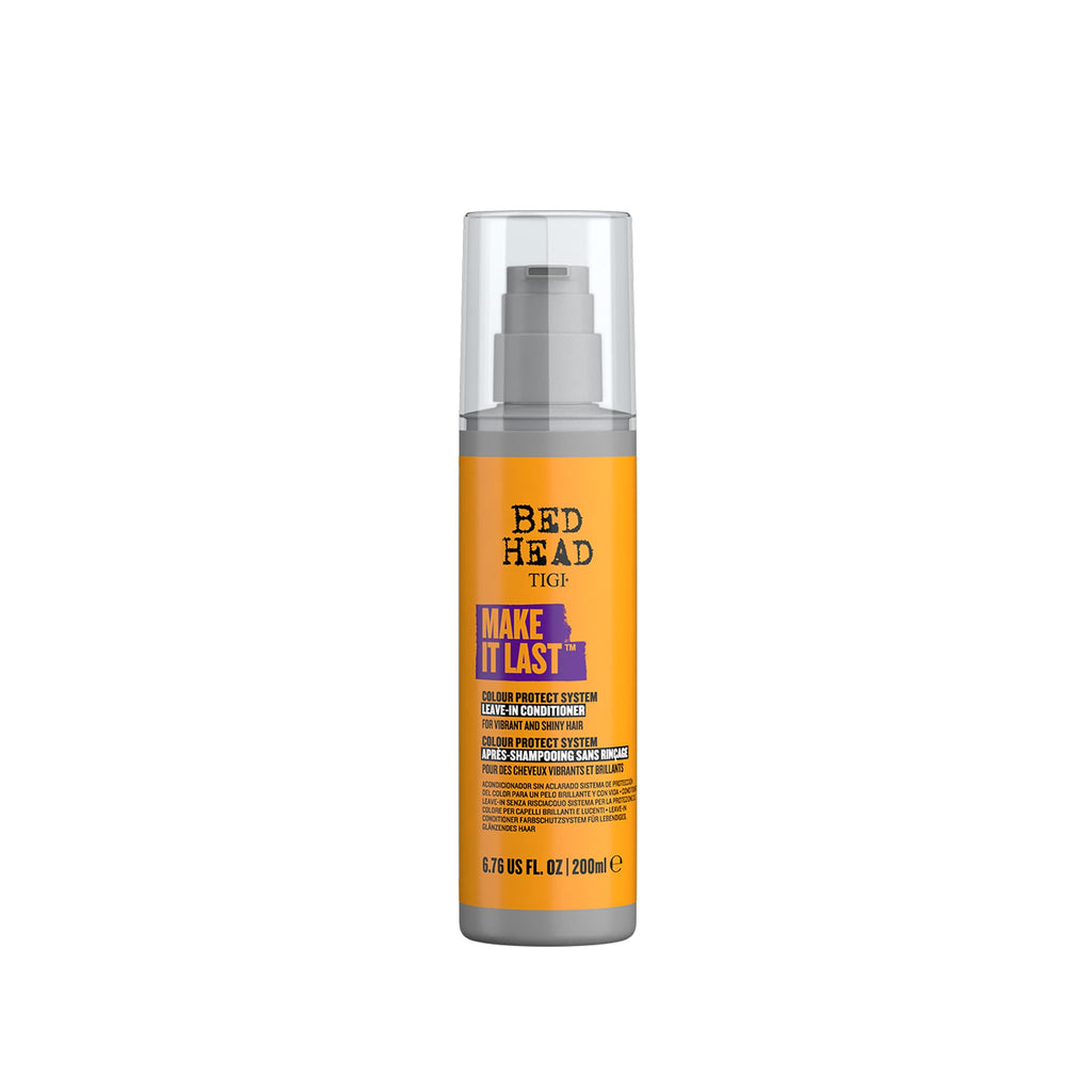 Hair care product bottle with orange label on a white background