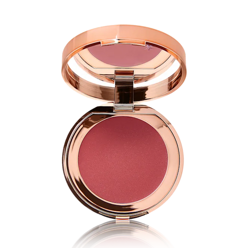 Compact blush with rose gold casing on a white background