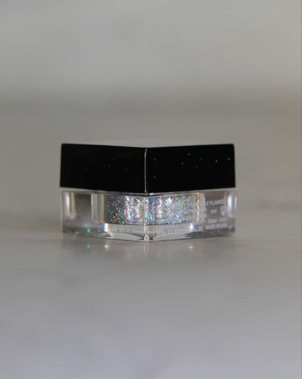 HUDA BEAUTY Kira Kira Dust birstošie mirdzumi - Perfectly Flawed