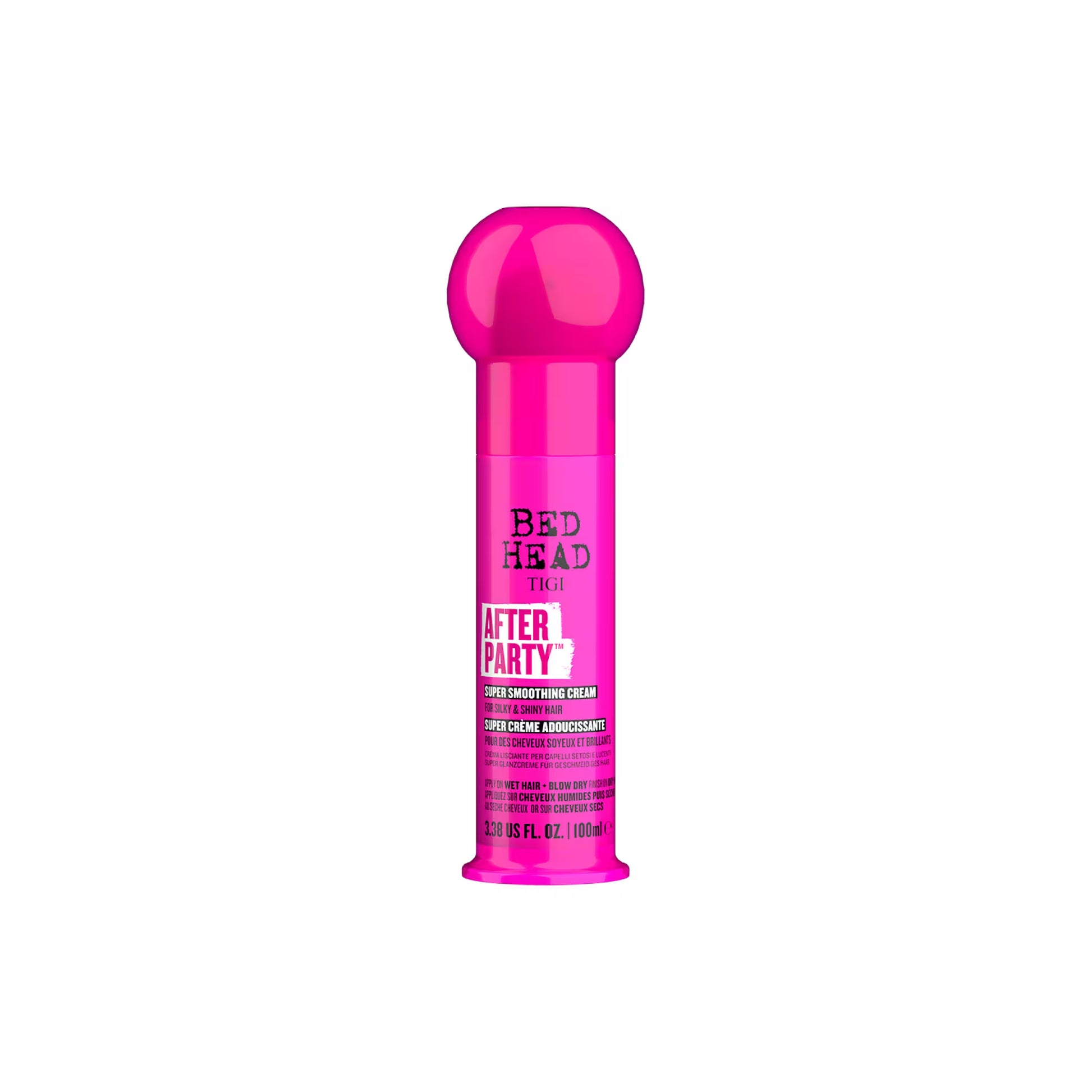 Pink hair product bottle labeled 'Bed Head After Party' on a white background