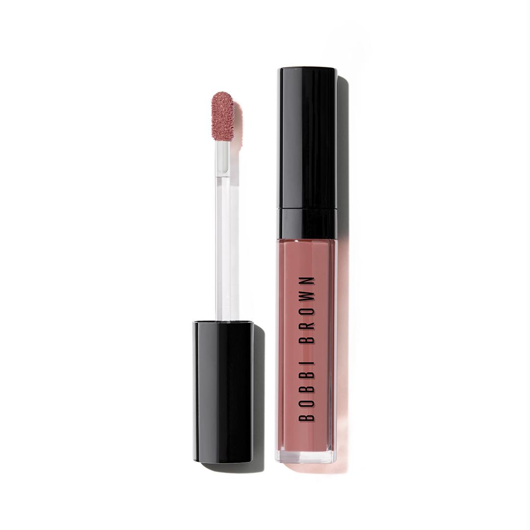 Bobbi Brown lip gloss with applicator on a white background