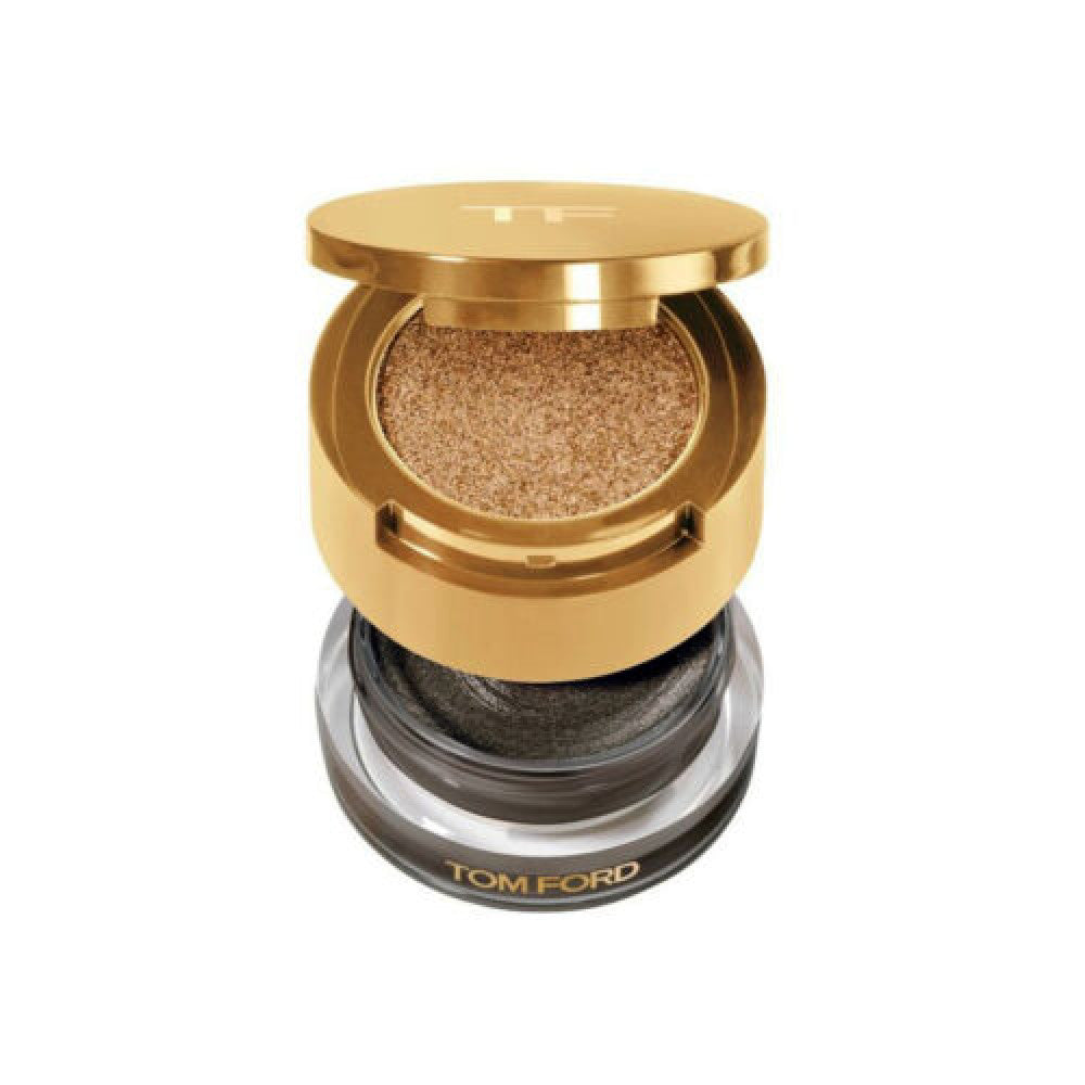 Tom Ford makeup product with gold and black design on a white background